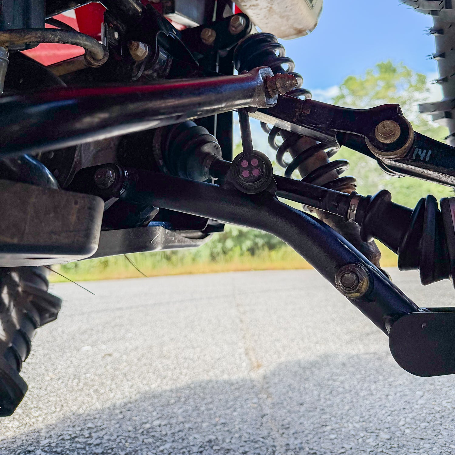 Honda Rubicon IRS rear control arms with increased ground clearance