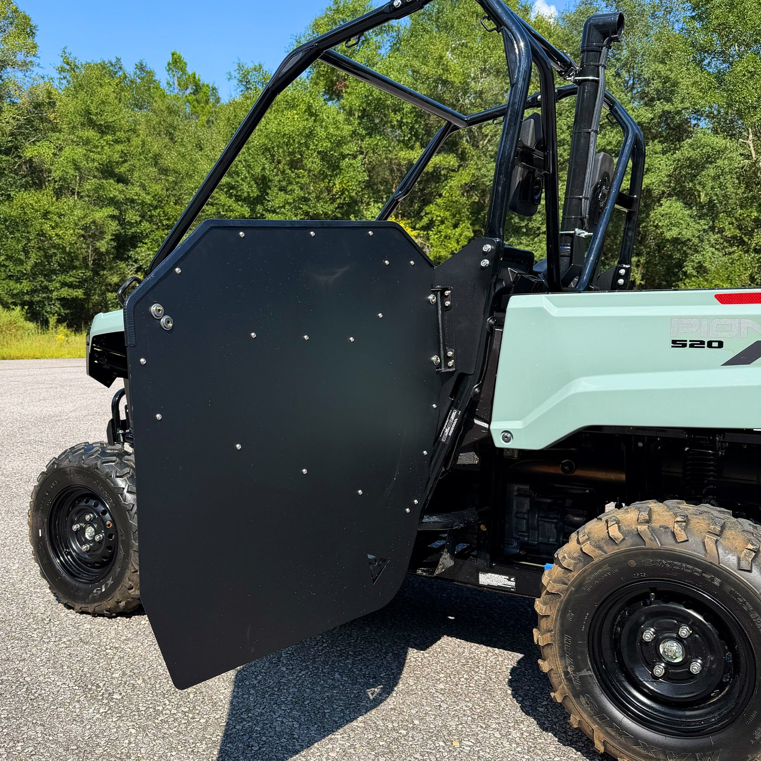 Honda Pioneer 520 high door option installed on side cab